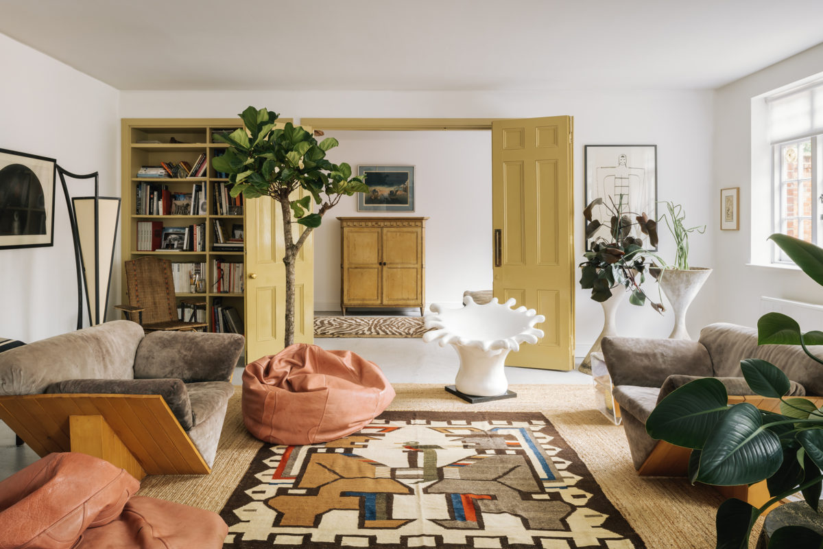 Living room interior with textiles and plants